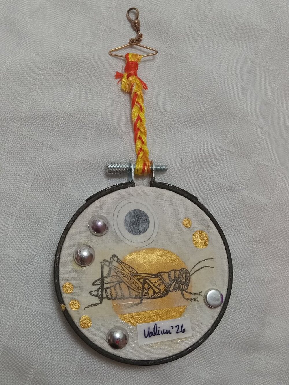 Handmade prints of old magazines on cotton & mixed media in a cross-stitch hoop